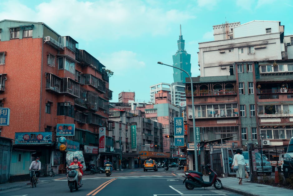 Explore vibrant street life in Taipei with a view of the iconic Taipei 101 towering above.